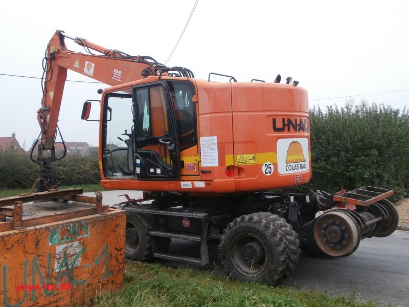 UNAC 22 TRR CATM315DLW5 M05000 Colas=32.JPG